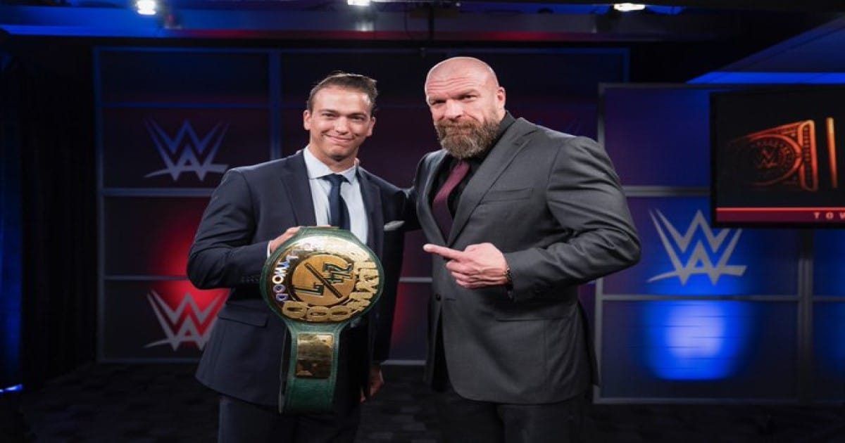 Triple H and corporate employee