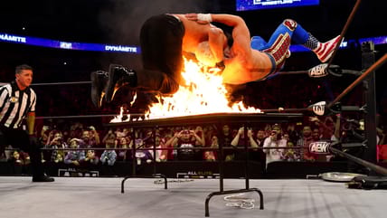 AEW Flaming Table Spot