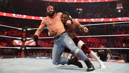 Elias Behind Seth Rollins