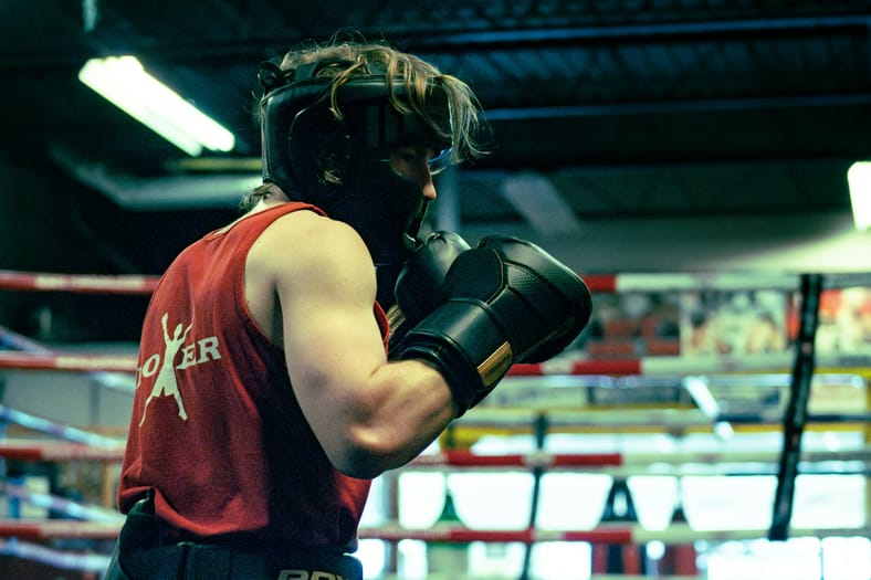 boxer with headgear and glove