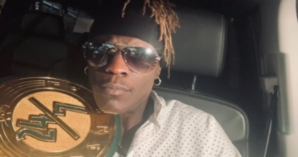 R-Truth with the 24/7 Championship